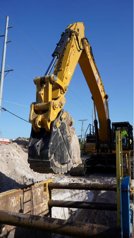 Picture showing an excavator performing open cut construction